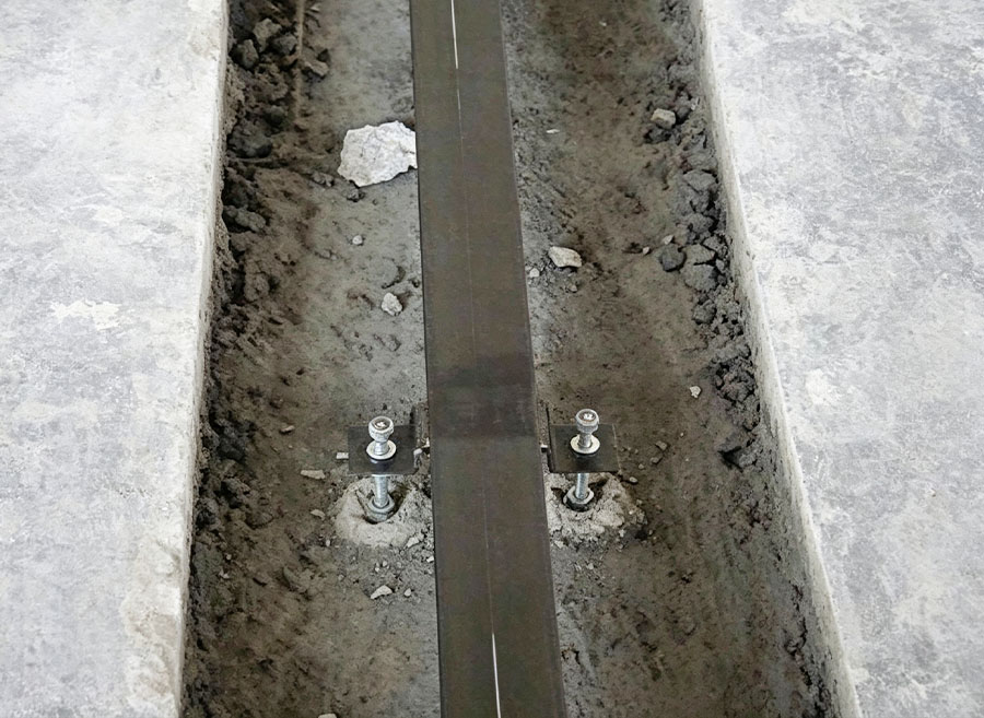 HUADE flush floor rail installed for a rail-mounted mobile pallet racking system