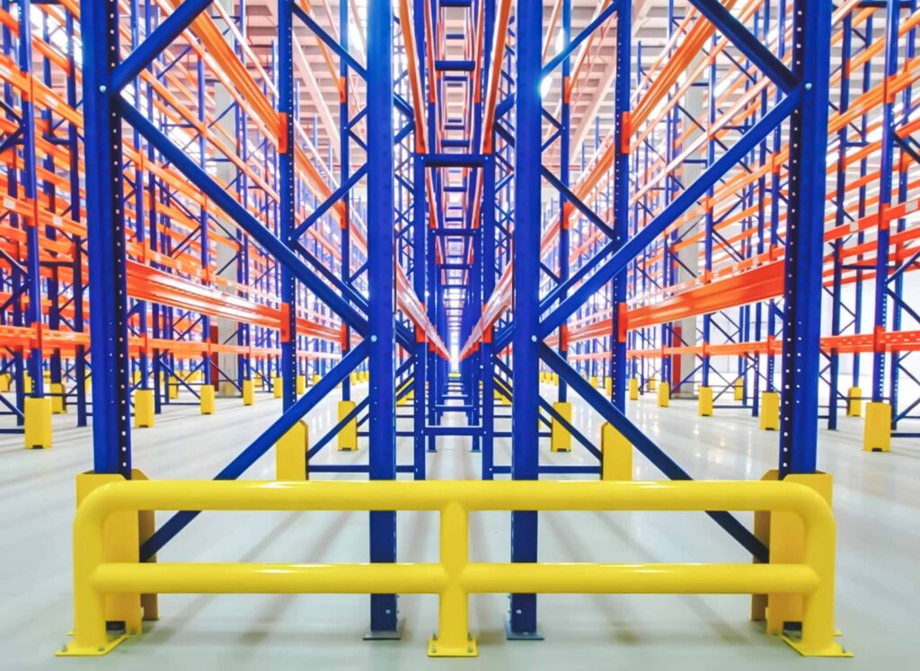 Horizontal and diagonal bracing supporting the pallet rack structure