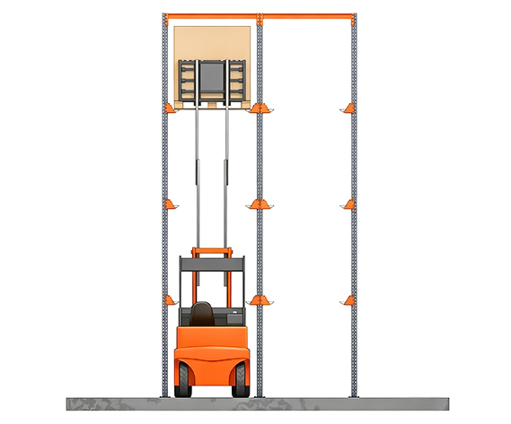 Forklift placing a pallet into a Drive-In Rack storage lane during the loading process.