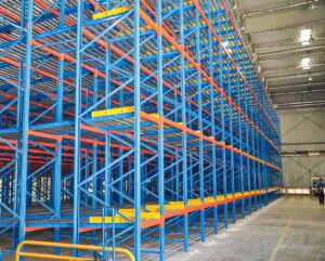 Pallet flow racking system with roller lanes for FIFO warehouse storage