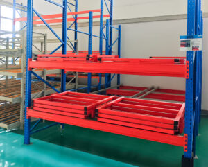 Push back pallet racking system for high-density warehouse storage