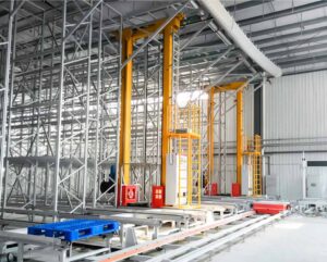 AS/RS stacker crane operating between high-bay racks