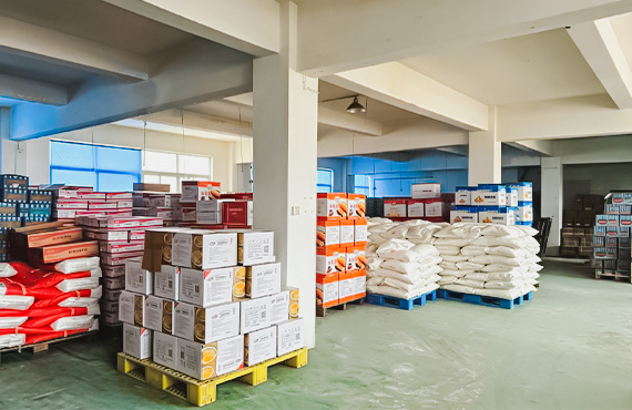 Packaged bread products stored on pallets in a food manufacturing warehouse