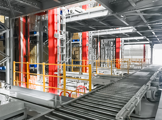 AS/RS racking with stacker crane and pallet conveyor system in a snack food warehouse