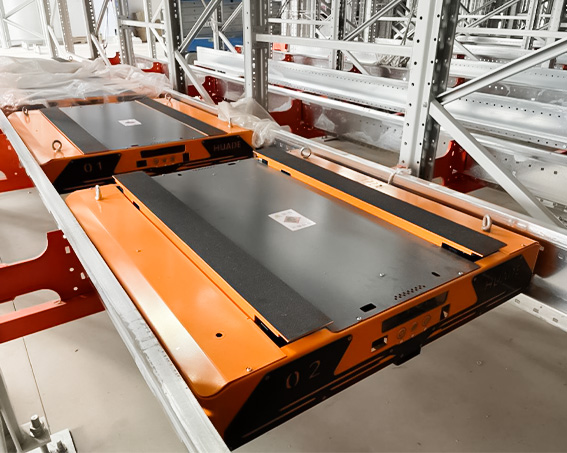 HUADE Four-Way Pallet Shuttle on Warehouse Rails